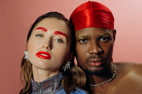 Man and Woman Wearing Silver Necklace