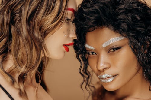 Close Up Shot of Two Women with Makeup