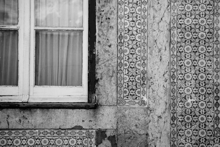 Ornaments On Wall Of House