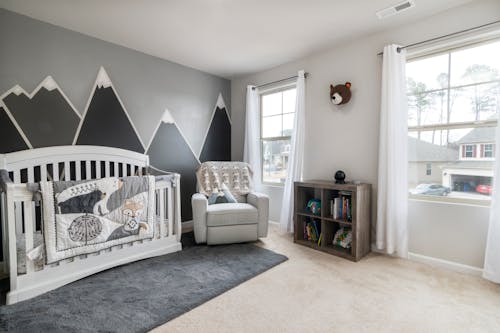 Free A Cozy Nursery Room with a Gray and White Theme Stock Photo