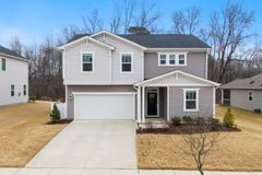 Charming two-story suburban home with garage in Fuquay-Varina, NC.