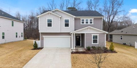 Charming two-story suburban home with garage in Fuquay-Varina, NC.