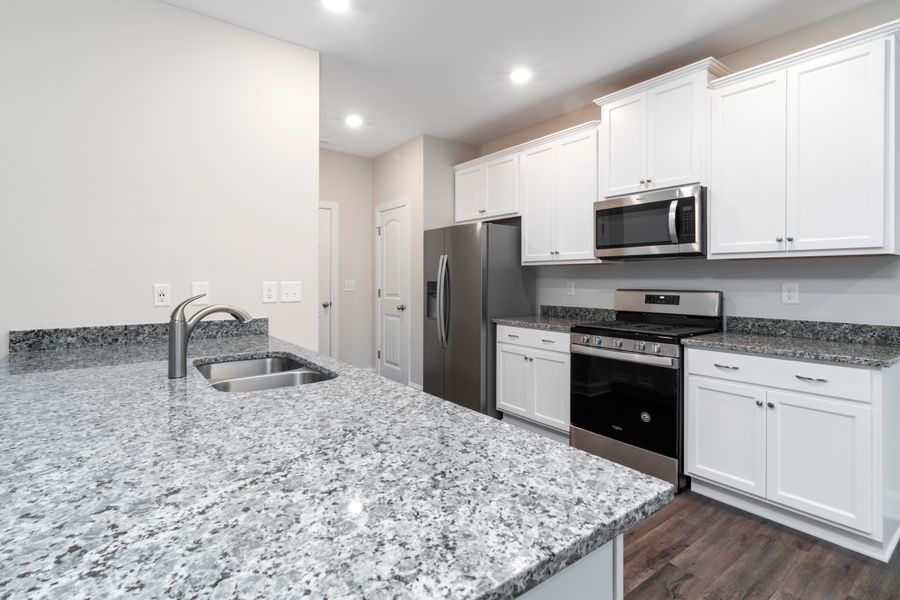 Black granite countertop kitchen island