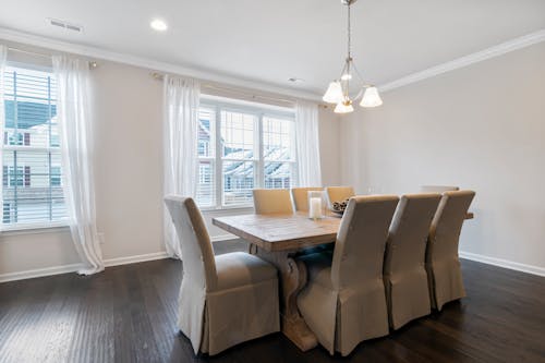 Brown Wooden Table With Brown Chairs