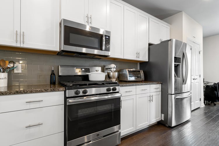 Fridge, Oven And Microwaves In Kitchen