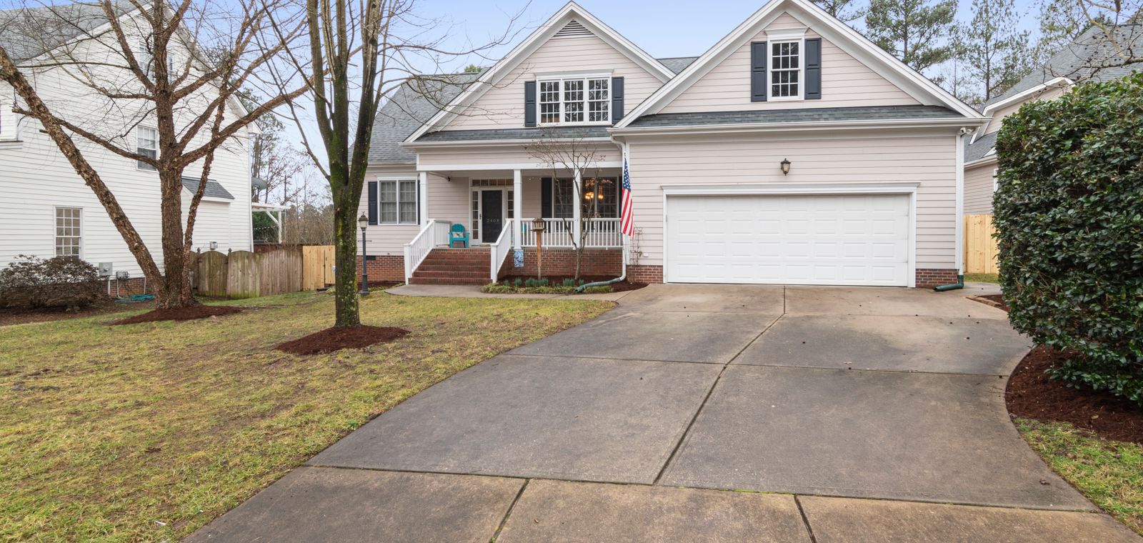 Well-kept suburban house with a driveway