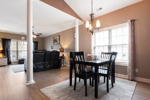 Free Bright and spacious open-plan dining and living room in a contemporary home. Stock Photo