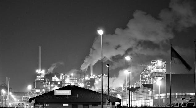 Grayscale Photography of a Factory