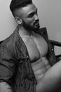 A Man with an Open Shirt Showing his Abs