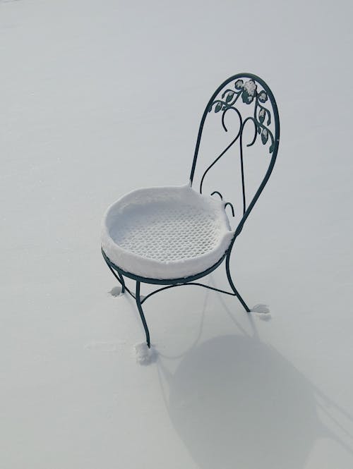 Free A Photo of Black Metal Chair  Stock Photo