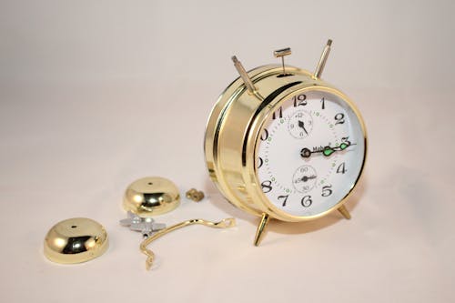 Free Round Brass and White Bell Alarm Clock Stock Photo