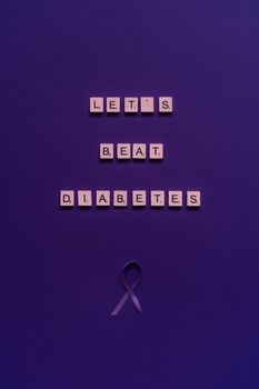 Inspirational 'Let's Beat Diabetes' message with ribbon on a purple backdrop symbolizing awareness.