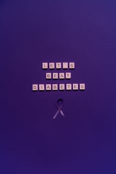 Scrabble pieces form 'Let's Beat Diabetes' on a purple background with a ribbon, symbolizing World Diabetes Day.