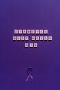 Scrabble Tiles on Purple Background