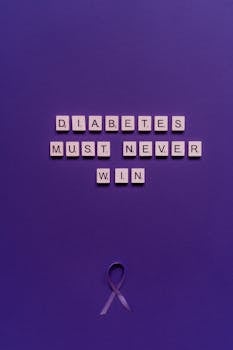 Inspirational message "Diabetes must never win" on a purple background with a ribbon symbolizing awareness.