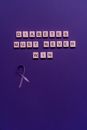 Scrabble Tiles on Purple Background