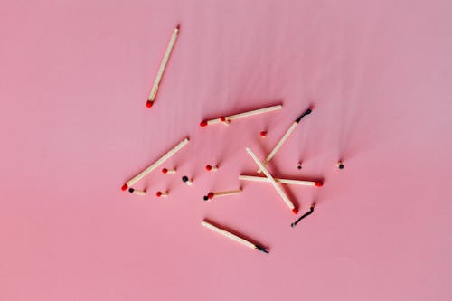 Free Wooden Matchsticks on the Pink Surface Stock Photo
