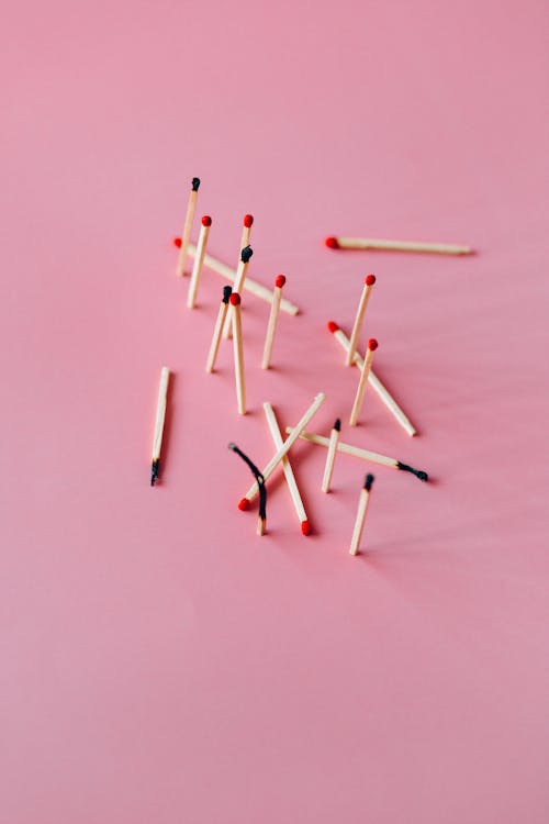 Free Wooden Matchsticks on the Pink Background  Stock Photo