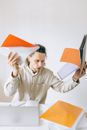 Anxious Employee holding Documents
