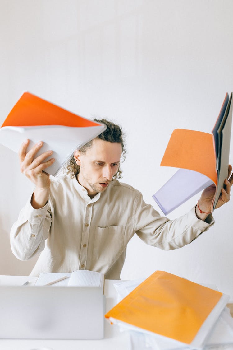 Anxious Employee Holding Documents