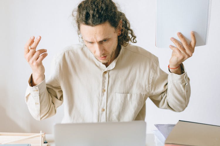 Anxious Employee Holding Documents