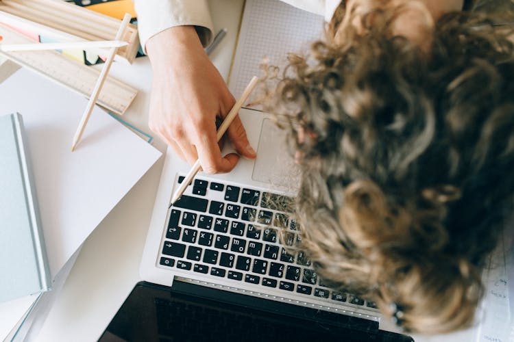 Male Employee Fell Asleep On Workspace