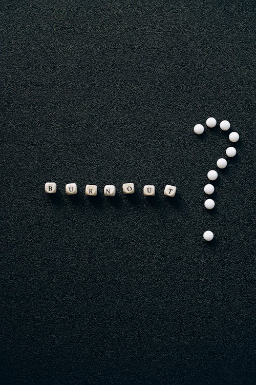 Letter Beads on Black Surface