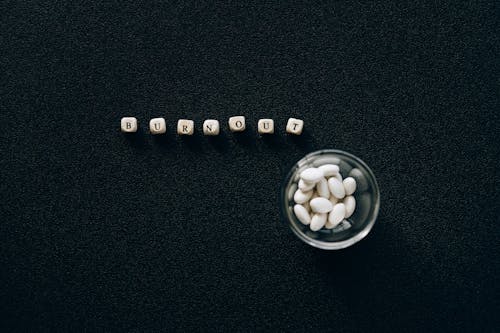 Letter Beads on Black Surface