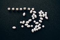 Letter Beads on Black Surface