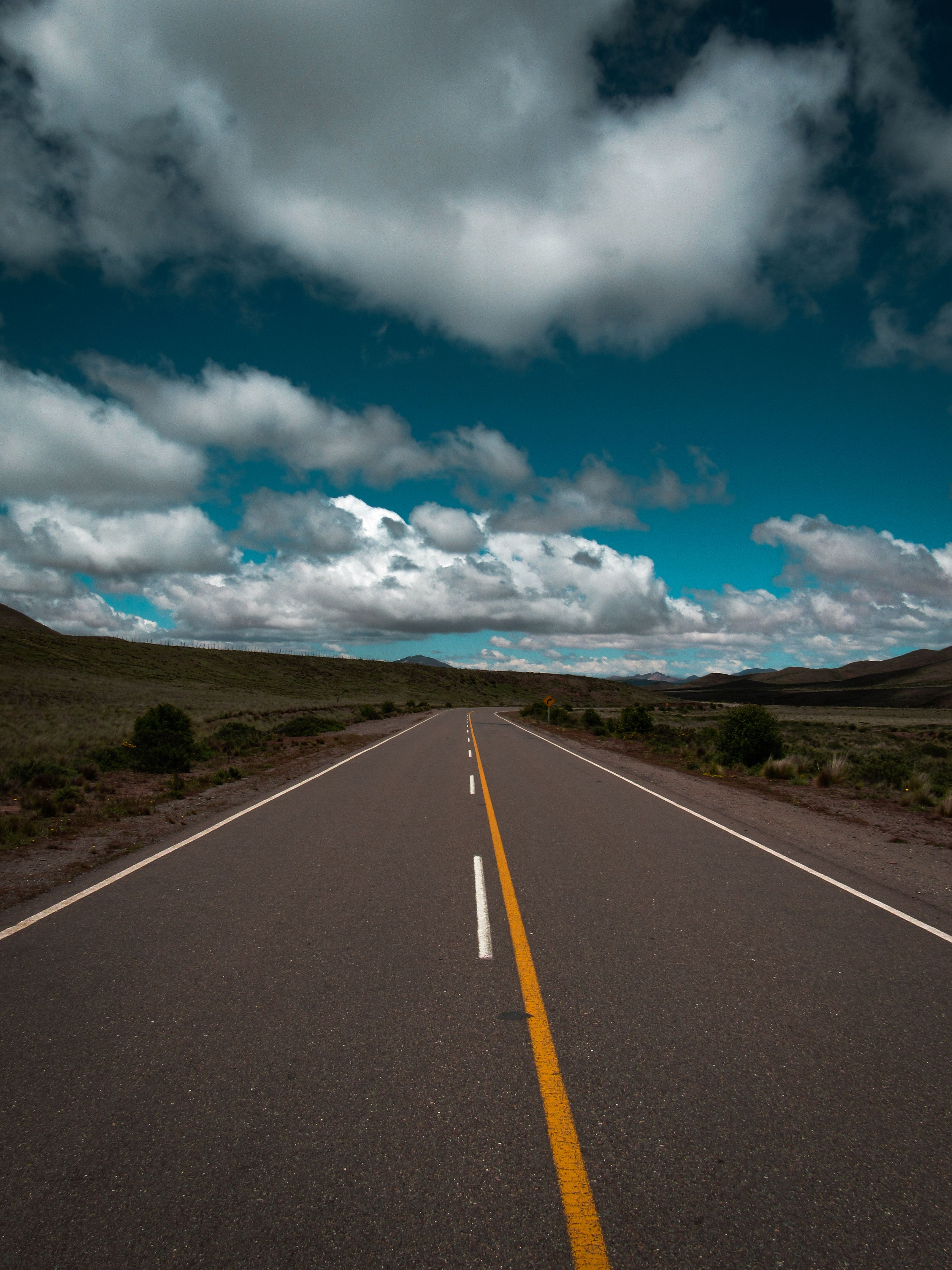 Asphalt Road Under Blue Sky with White Clouds · Free Stock Photo