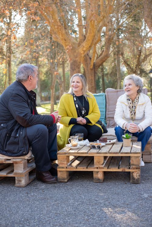 Elderly People Having a Conversation Over a Cup of Tea · Free Stock Photo