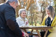Elderly People Playing Dominoes
