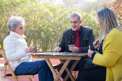 Free Elderly People Playing Cards  Stock Photo