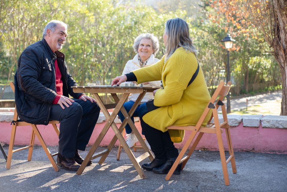 neighbors seated at table