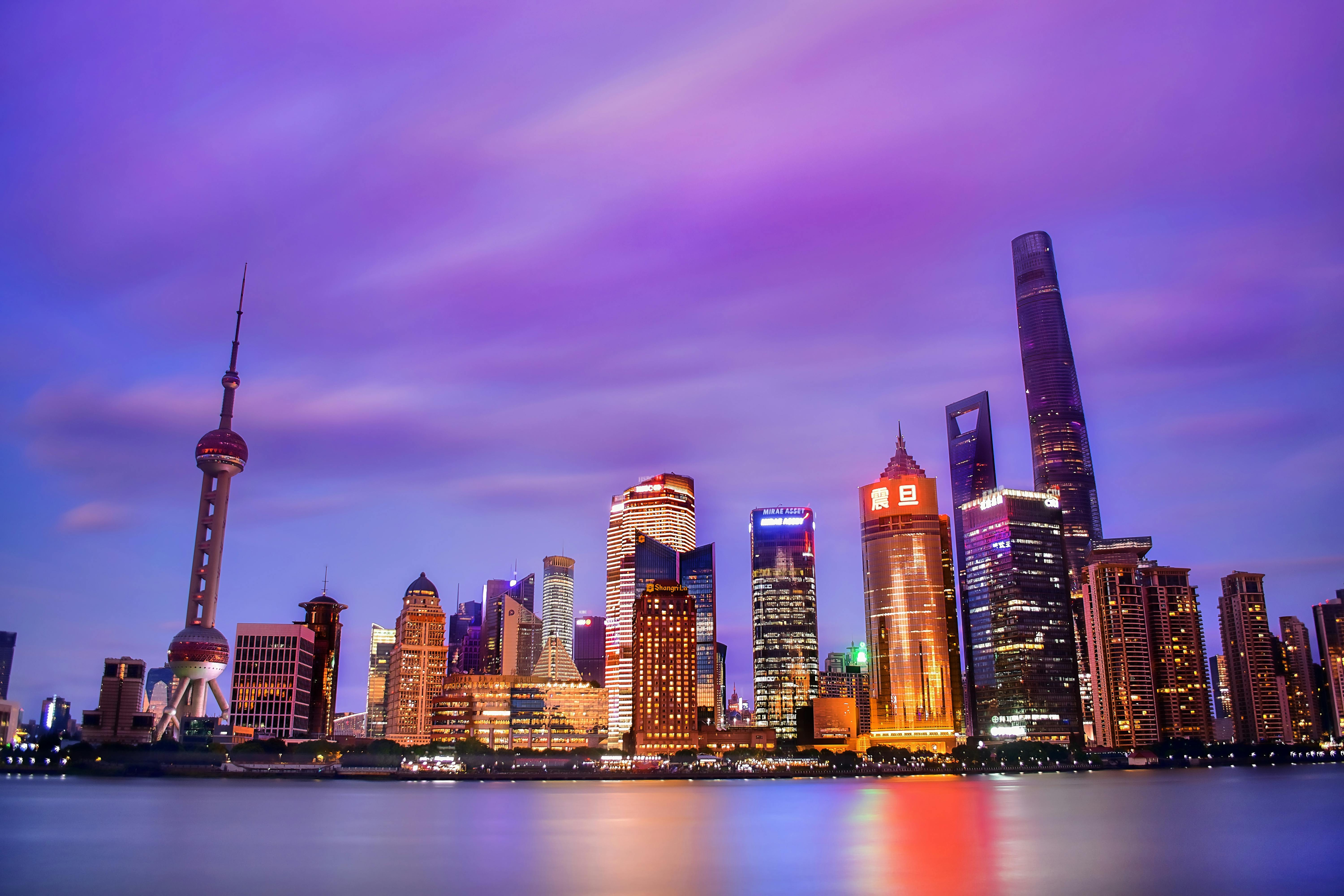 illuminated buildings at dusk