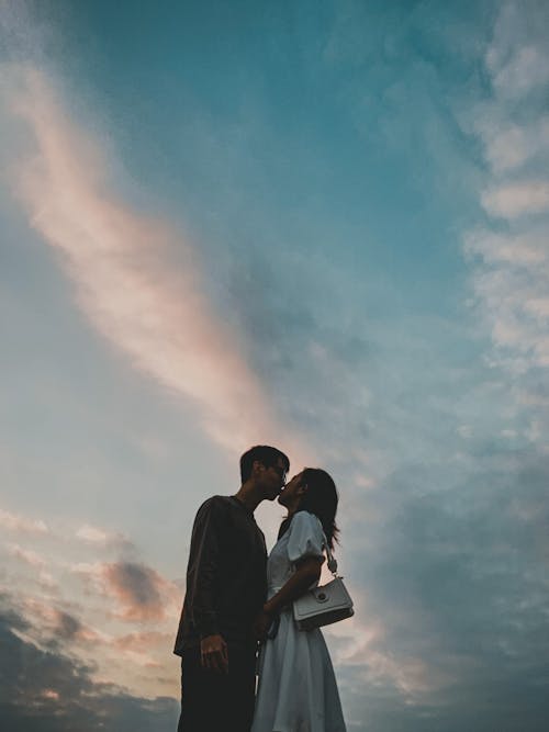 A Couple Kissing Under the Sky 