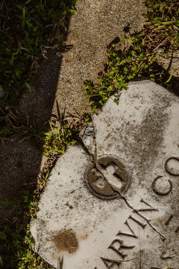 Overhead Shot Of A Tombstone On The Ground