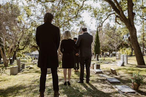 Free Photo of People standing on Graveyard Stock Photo