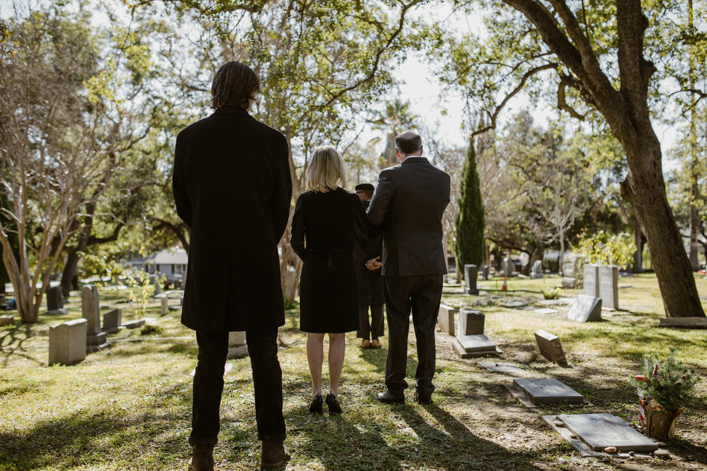 Photo of People standing on Graveyard