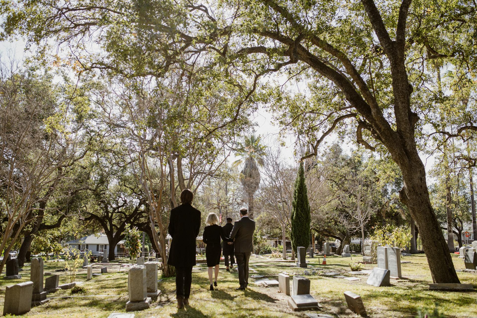 Photo of People standing on Graveyard
