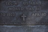 Engraved Epitaph on Gray Tombstone