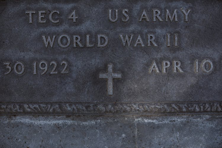 Engraved Epitaph On Gray Tombstone