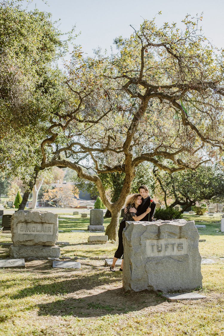 
A Man Consoling A Grieving Woman