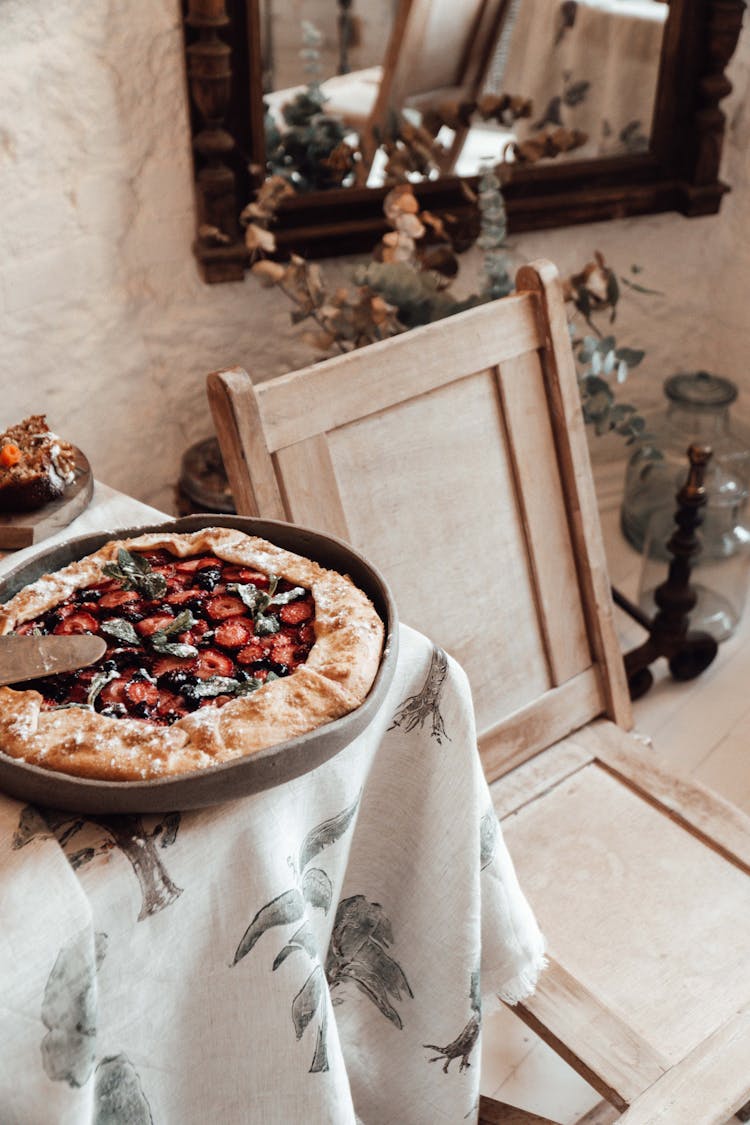 Delicious Berry Pie In Baking Dish On Table