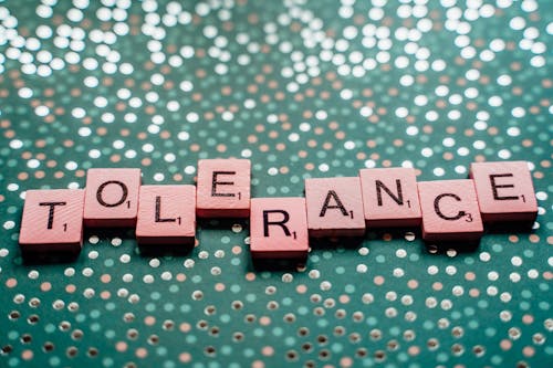 Free Scrabble Tiles Spelling Out the Word Tolerance Stock Photo