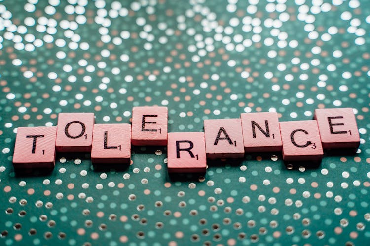 Scrabble Tiles Spelling Out The Word Tolerance