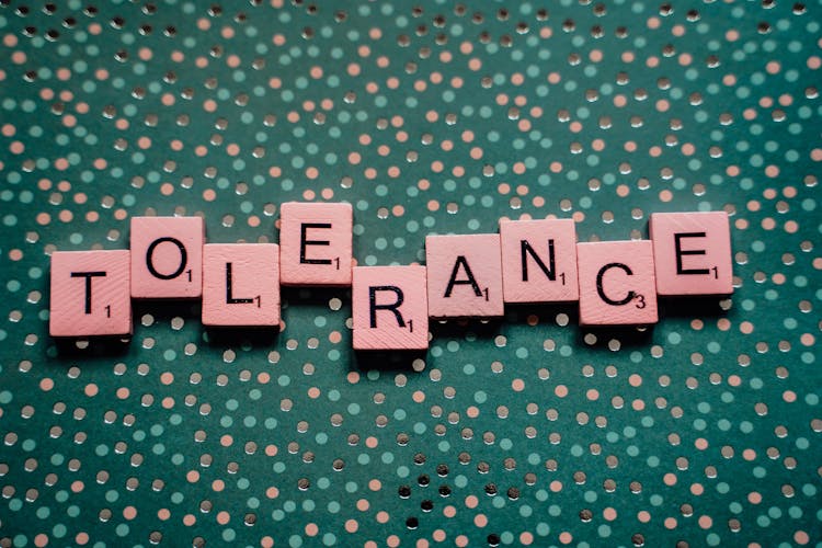 Scrabble Tiles Spelling Out The Word Tolerance