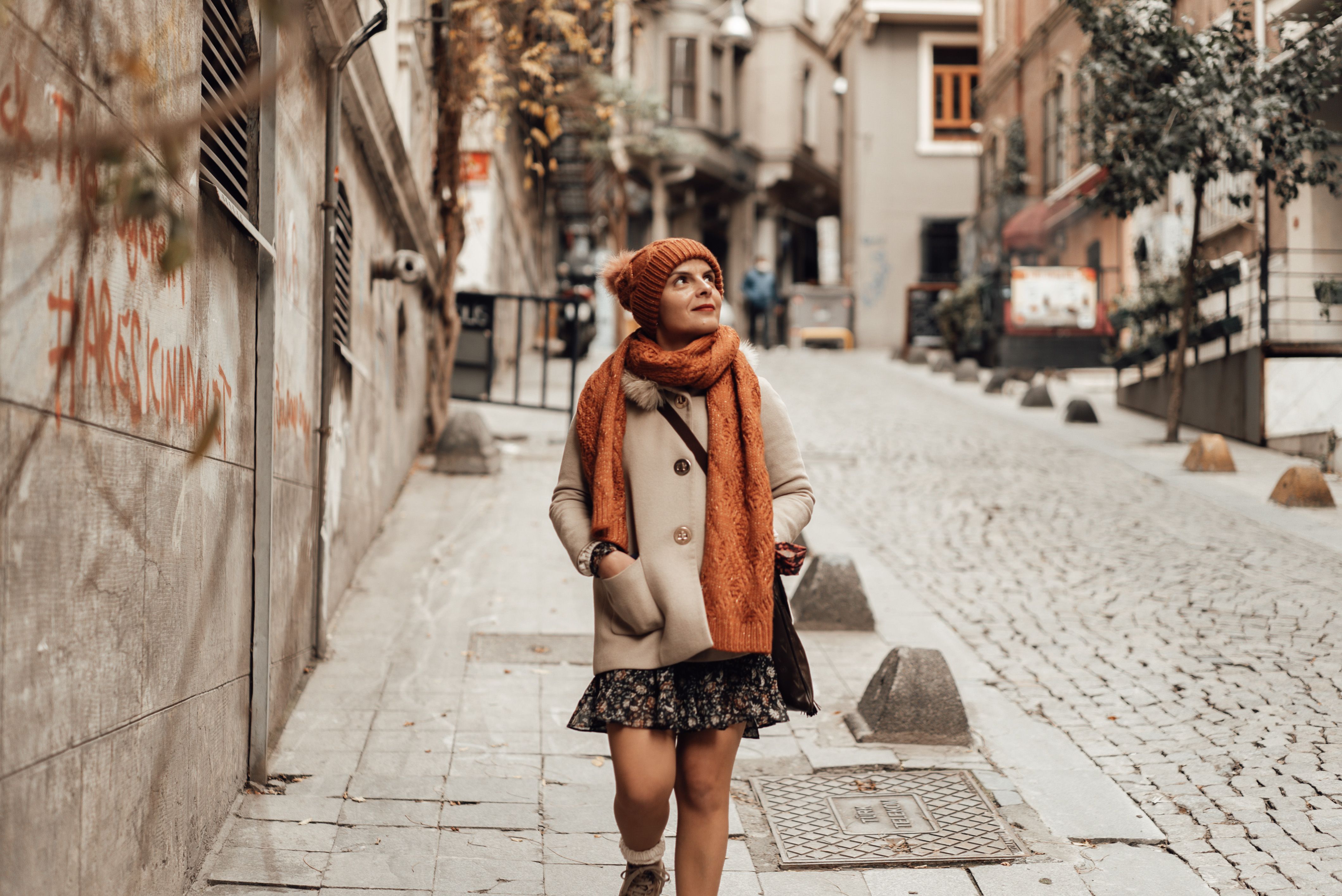 Stylish woman walking on street in city · Free Stock Photo