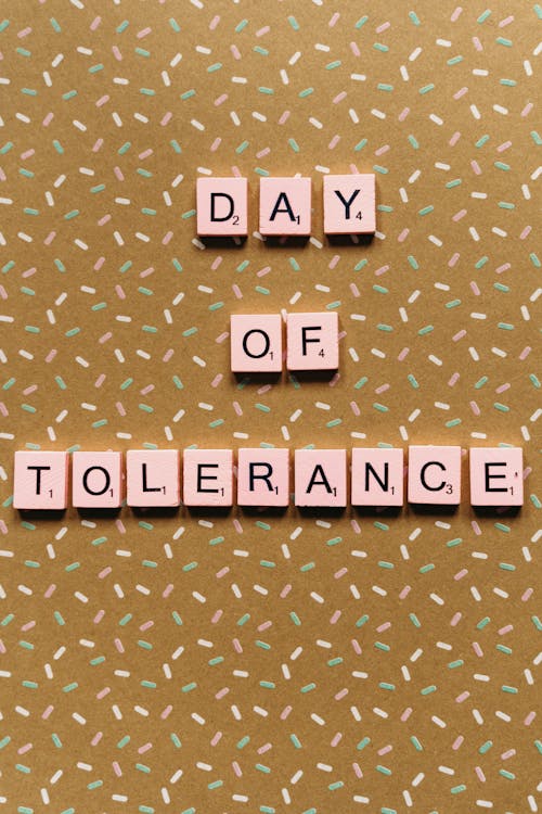 Free Day of Tolerance Spelled with Scrabble Tiles Stock Photo
