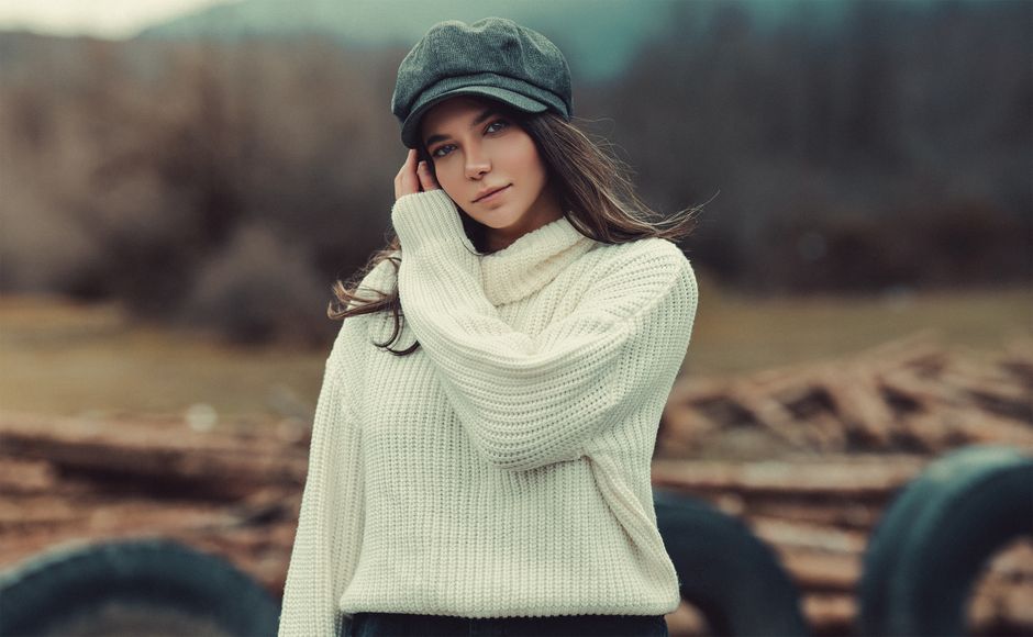 Woman wearing a cozy knit sweater outdoors